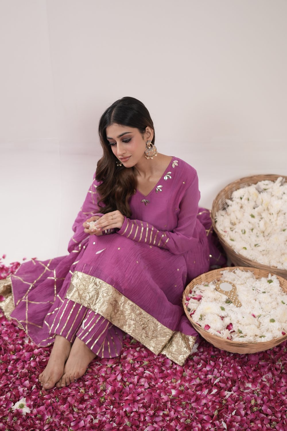 Kinari Kraft Pink Anarkali suit set — seated editorial view