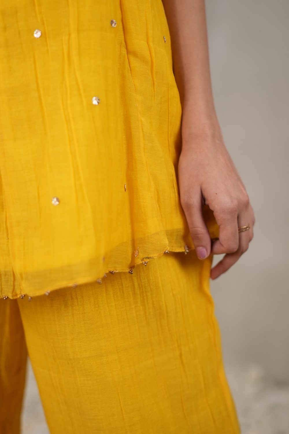 Sunehri Slouch Yellow co-ord set — hem and fabric detail