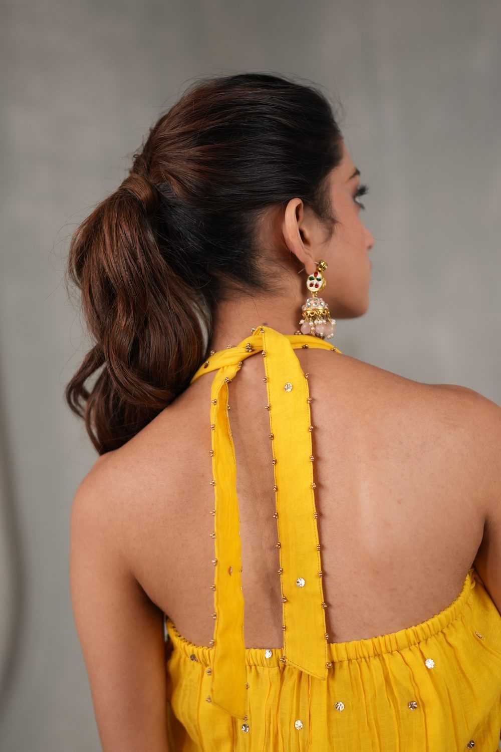 Sunehri Slouch Yellow co-ord set — halter tie back detail