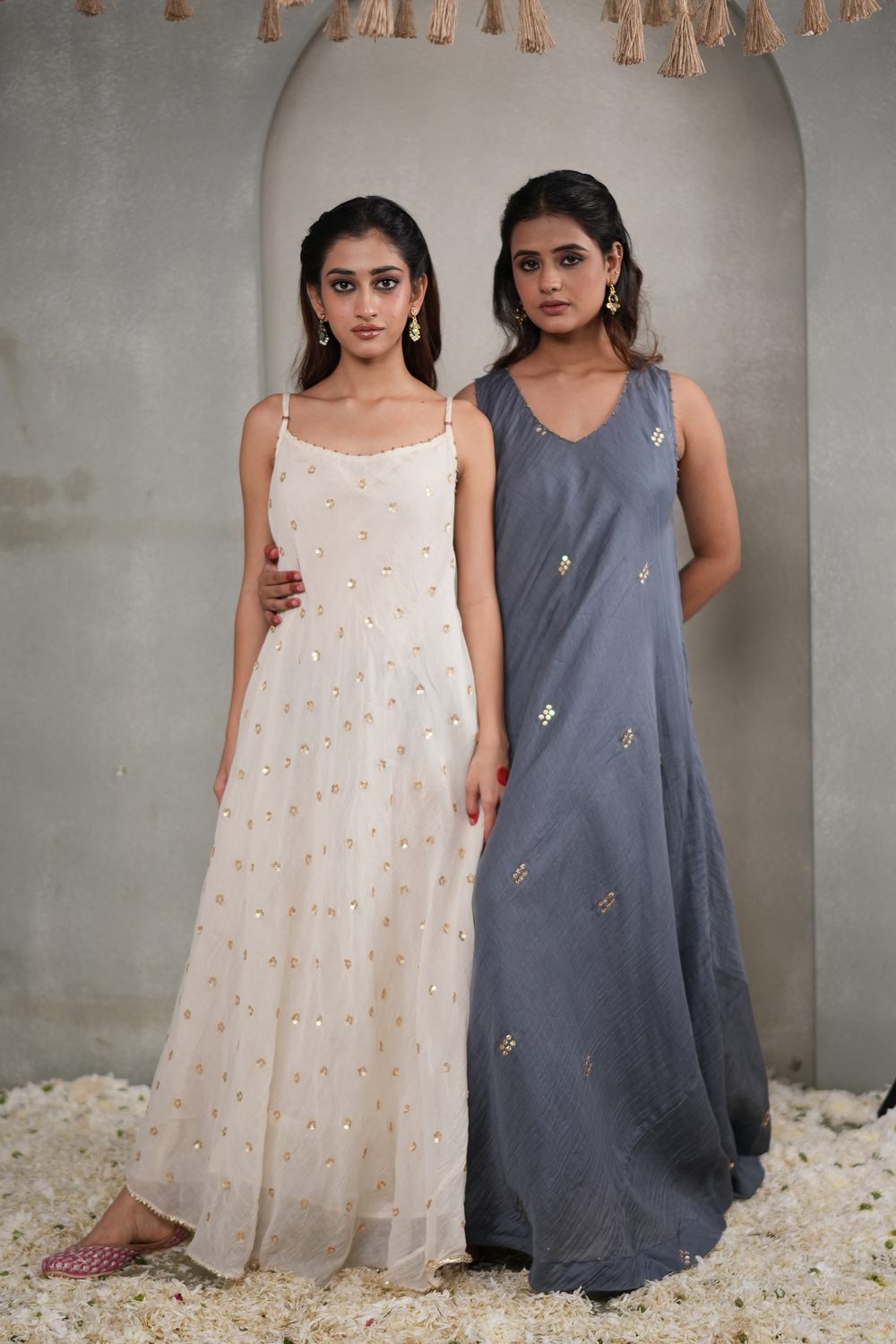 Sitara Swirl Ivory asymmetric dress — coordinated editorial view